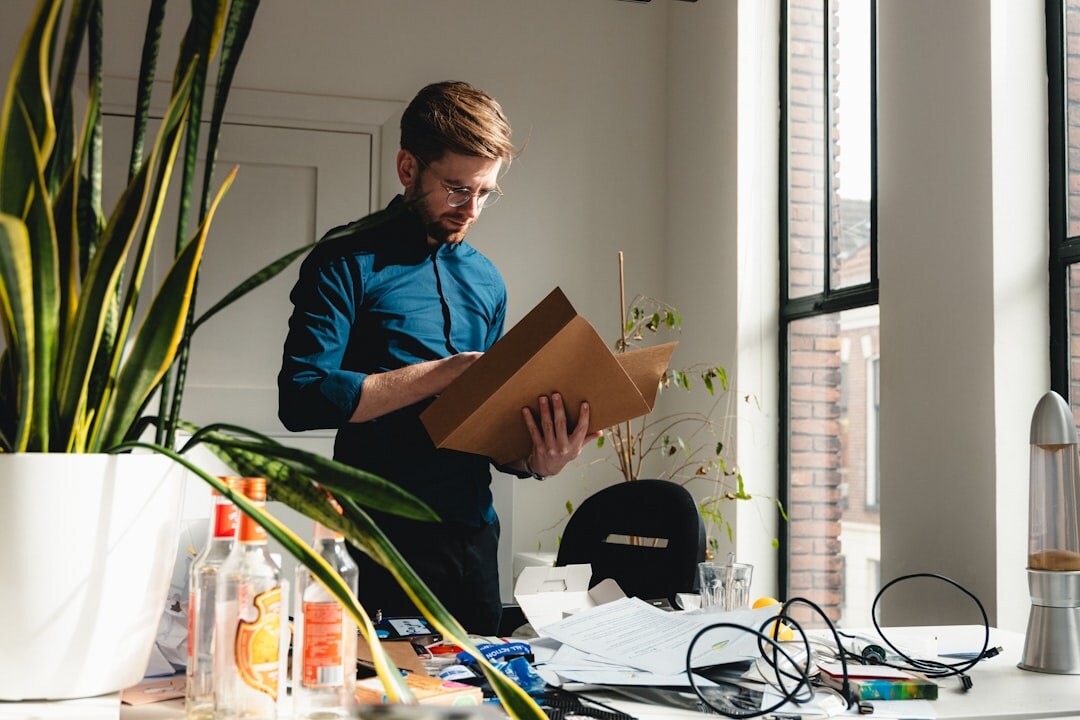 person packing boxes for moving abroad