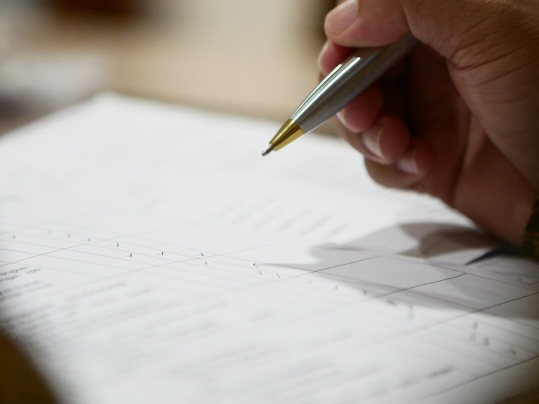 person checking financial documents
