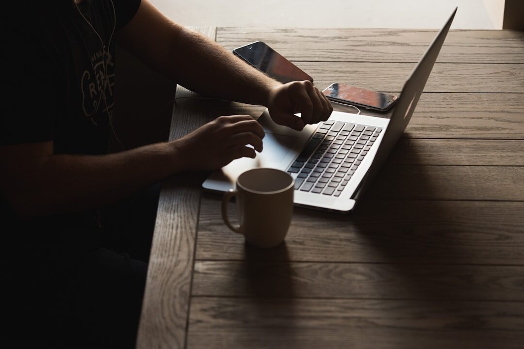 person using laptop for tax comparison